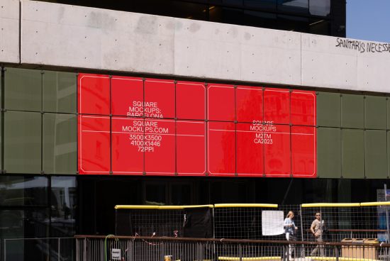 Urban street with large red square mockup banners on a building facade, showcasing different resolution specs for design assets.